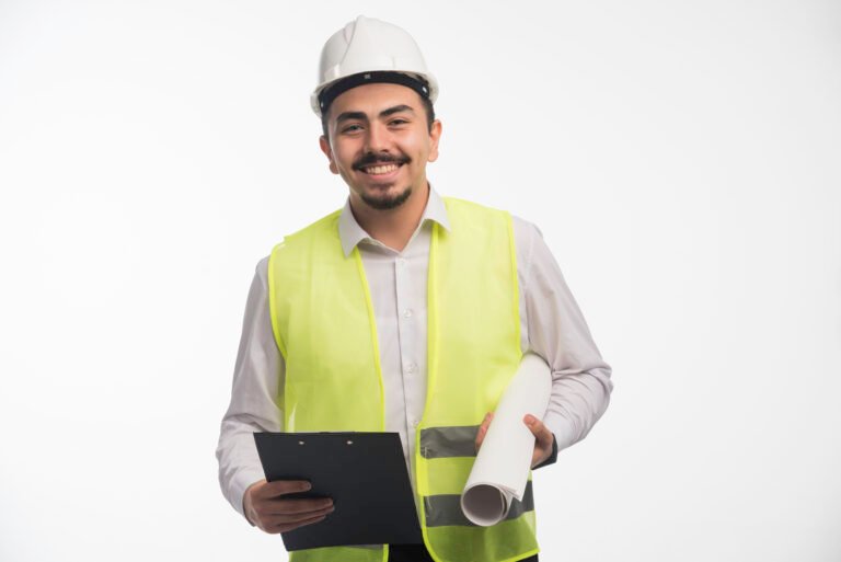 Engineer in uniform holding project plan and tasklist Image description